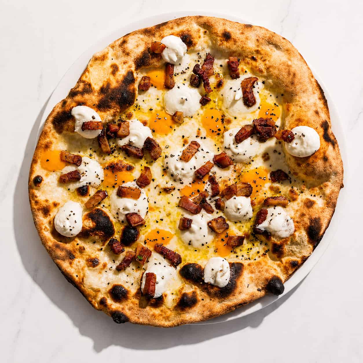 A’ Carbonara Pizza - White Base, Pecorino Romano, Guanciale, Free-Range Egg Yolk, Black Pepper