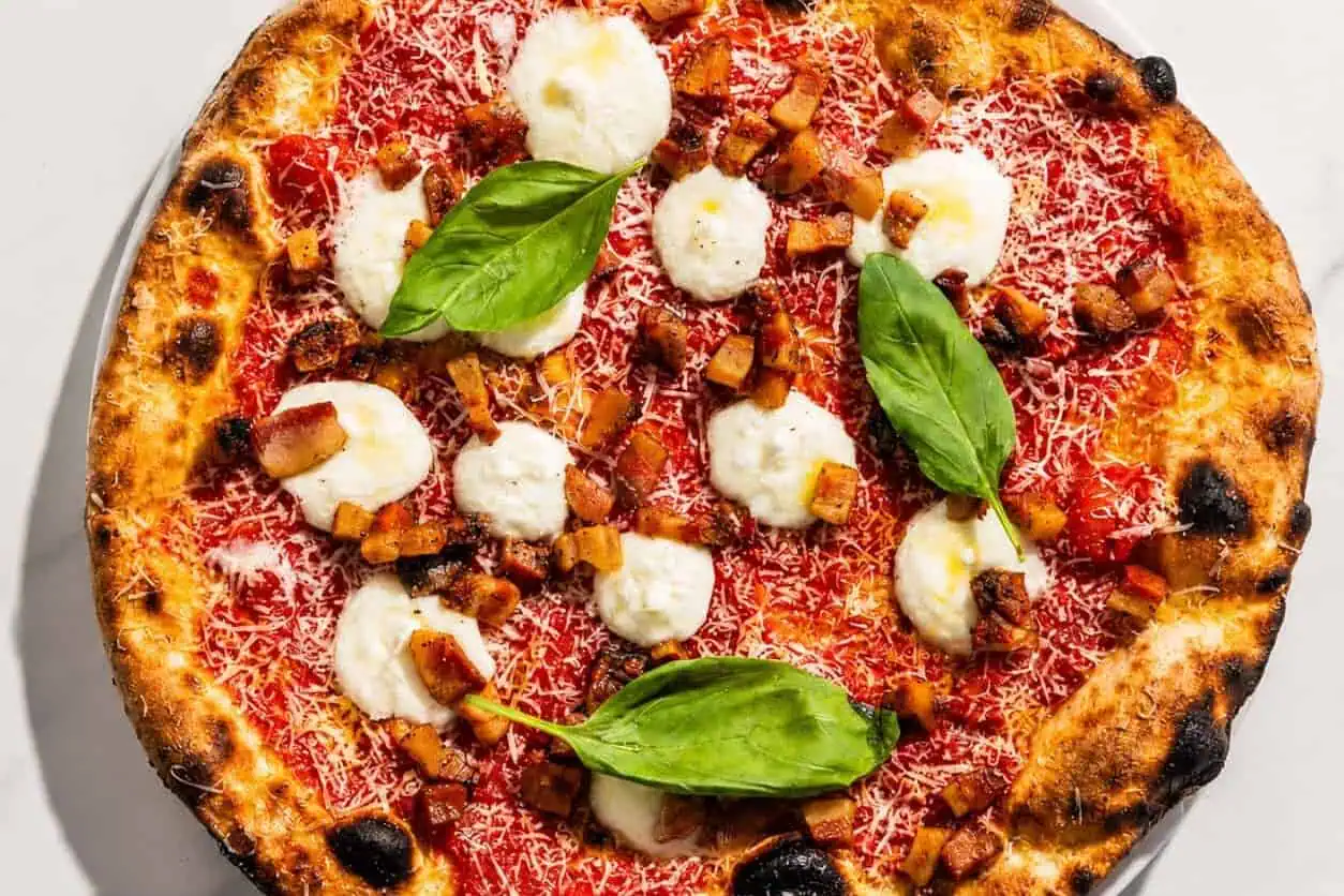 Amatriciana Pizza - San Marzano, Guanciale, Pecorino Romano, Basil, Coratina Extra Virgin Olive Oil
