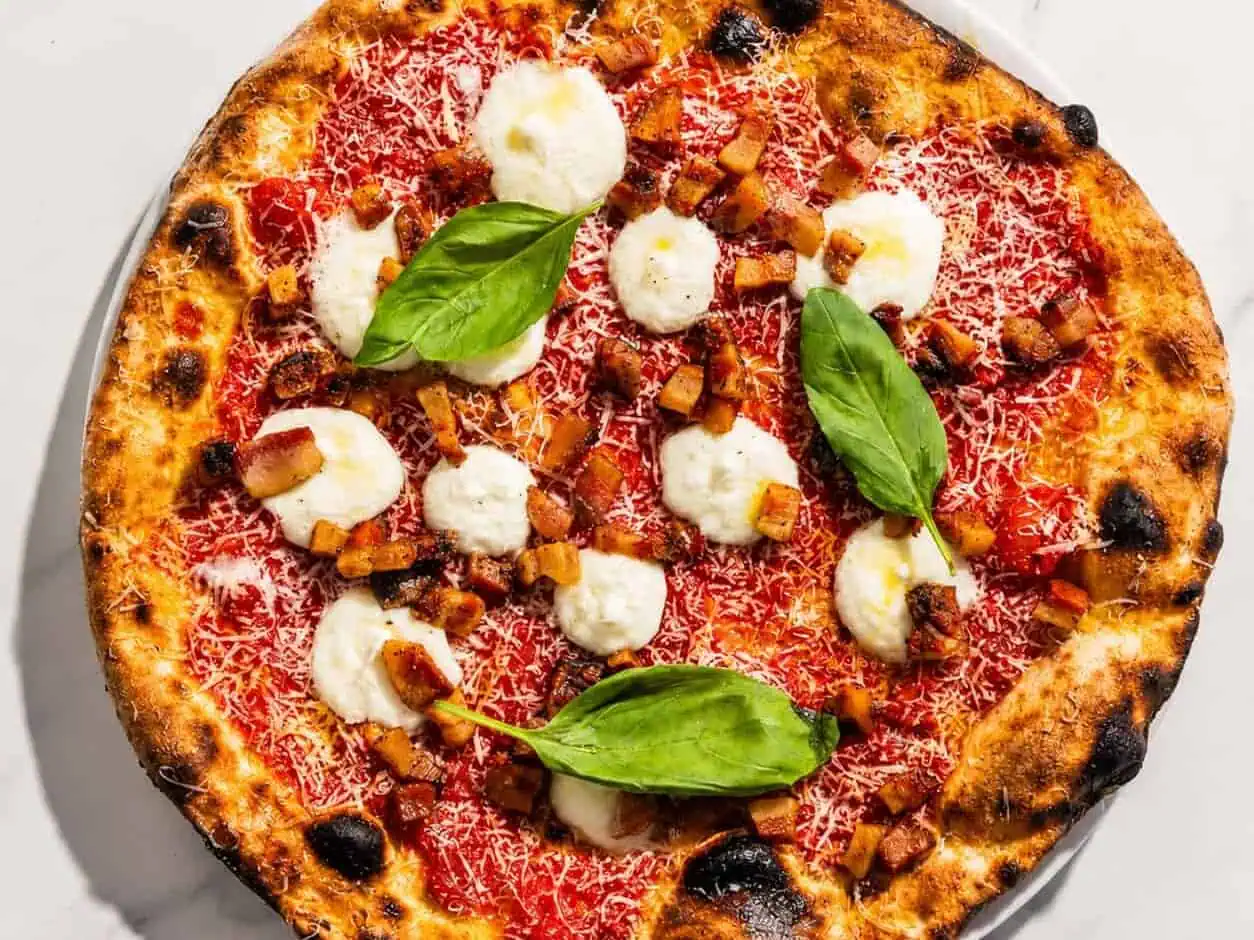 Amatriciana Pizza - San Marzano, Guanciale, Pecorino Romano, Basil, Coratina Extra Virgin Olive Oil