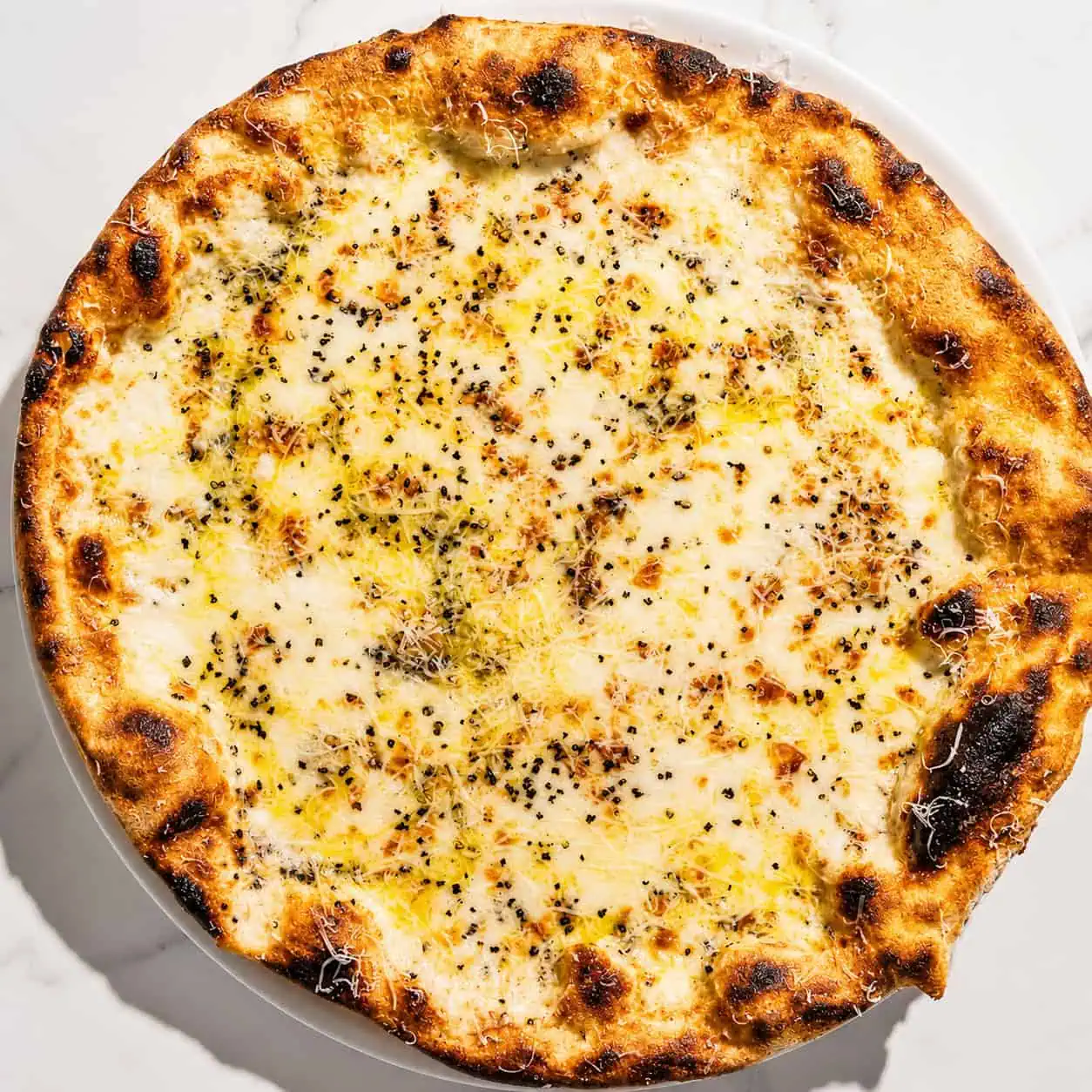 Cacio e Pepe Pizza - White Base, Pecorino Romano, Black Pepper