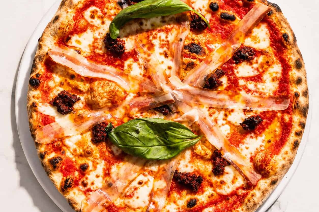 Calabrese Pizza - San Marzano, Buffalo Mozzarella, &lsquo;Nduja, Pancetta, Basil, Coratina Extra Virgin Olive Oil