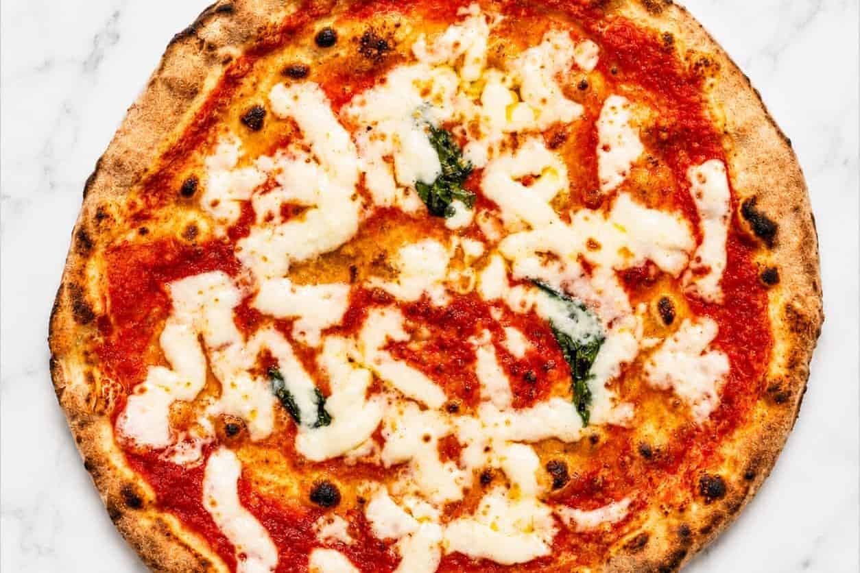 Margherita Classica Pizza - San Marzano, La Stella Buffalo Mozzarella, Pecorino Romano, Parmigiano Reggiano, Basil, Coratina Extra Virgin Olive Oil