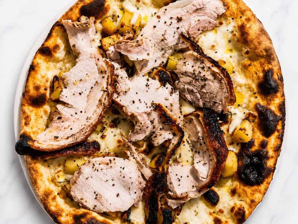 Porchetta di Ariccia Pizza - White Base, Porchetta alla Romana, Wood-Fired Roasted Potatoes, Rosemary, Black Pepper