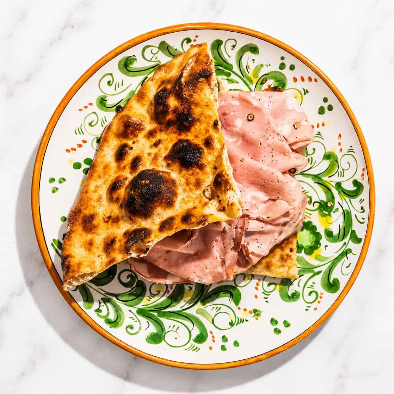 Schiacciata con'botto de Mortazza - Crispy Crust with Mortadella